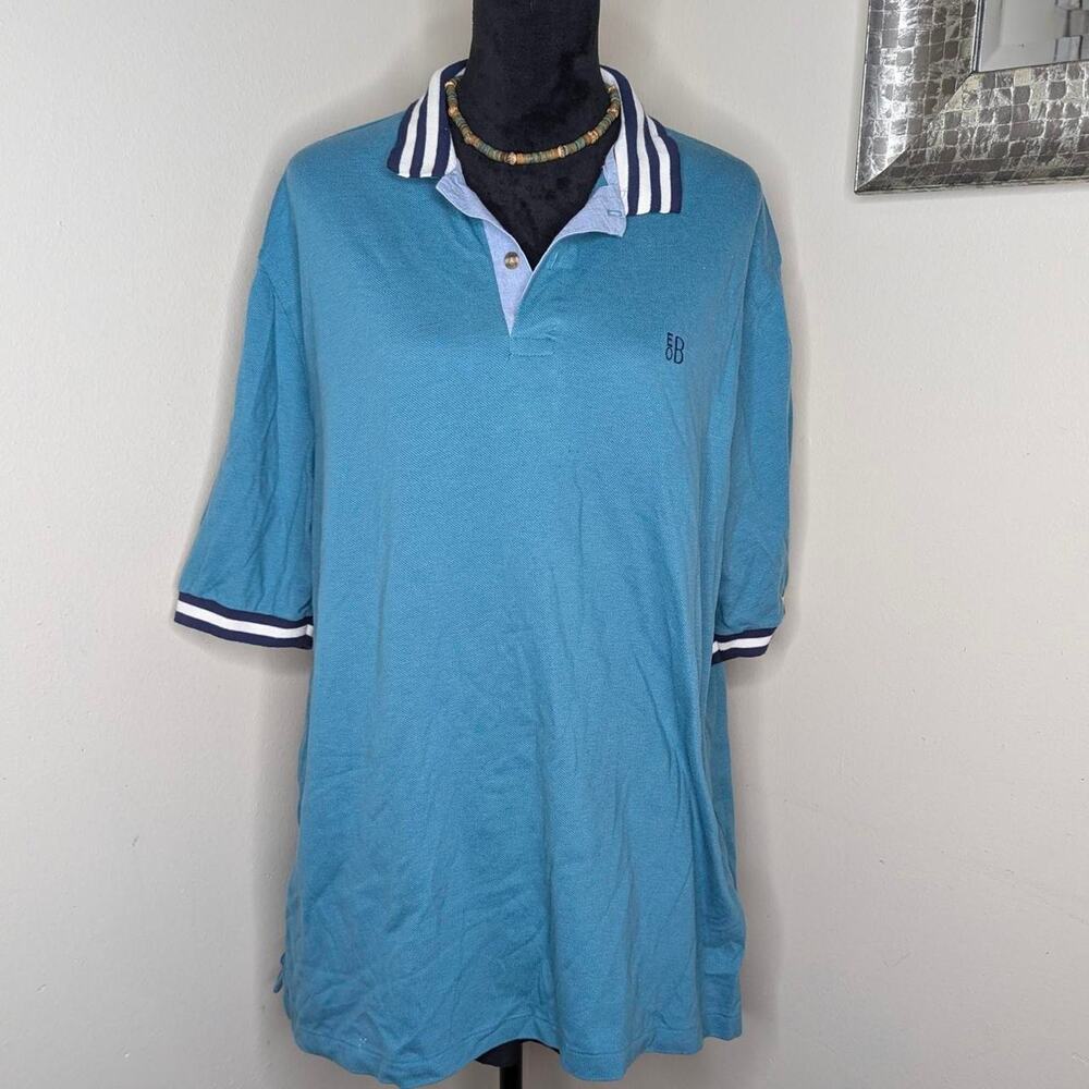 Teal green polo style shirt with